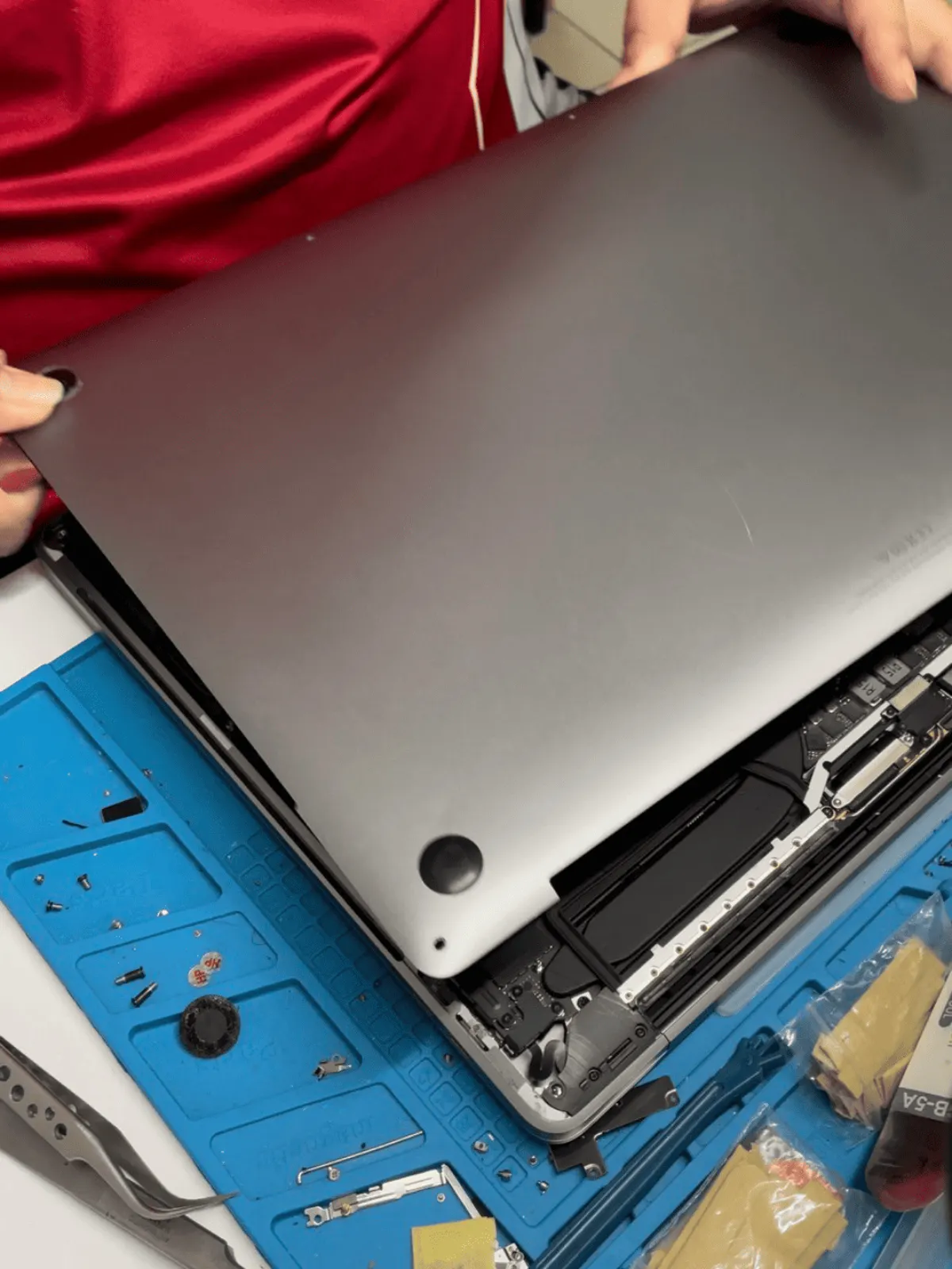 13-inch MacBook Pro opened on the bench to test the display connection